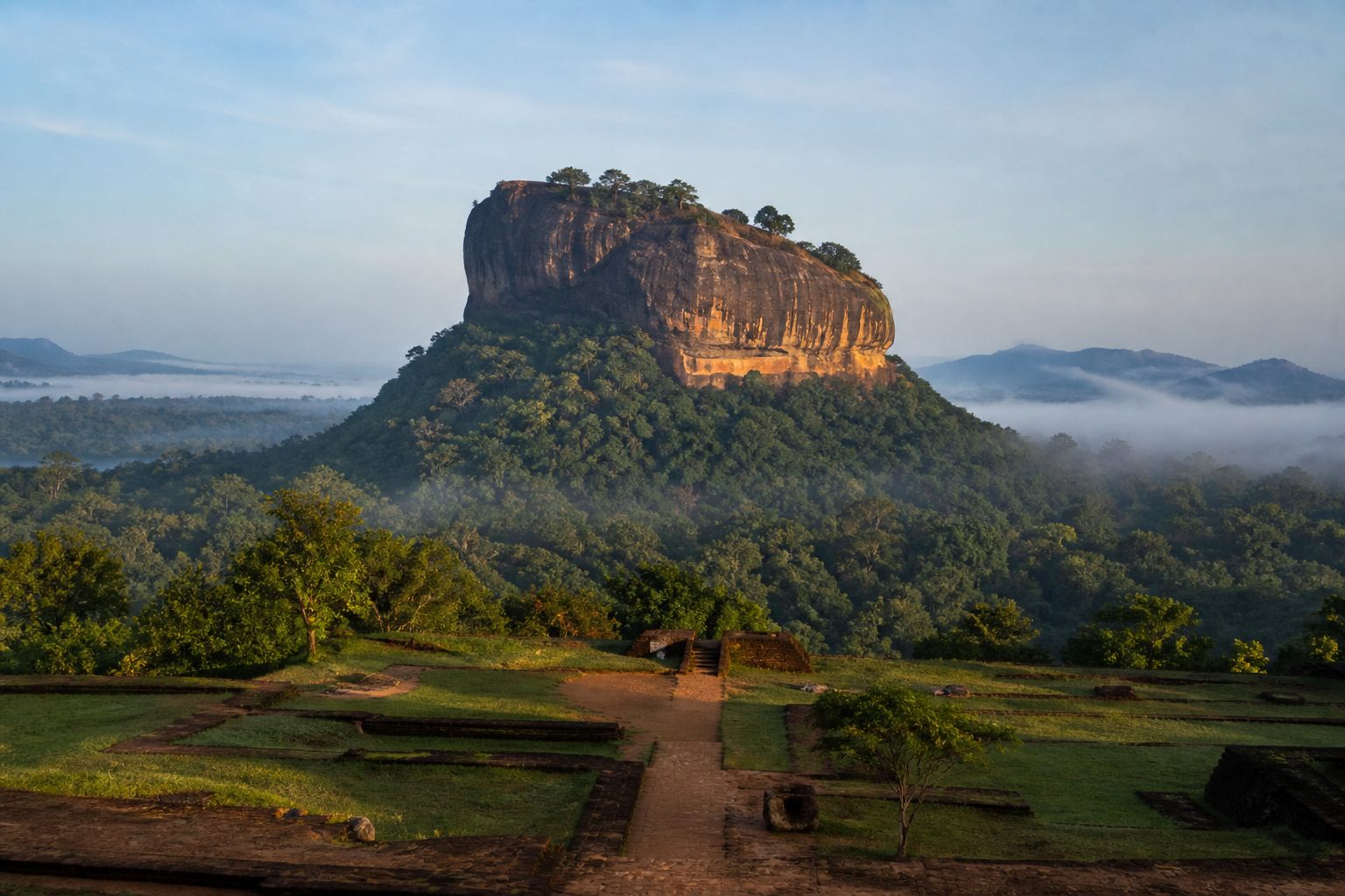 Sigiriya Rock Fortress above the surrounding forest